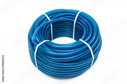 A rubber hose wrapped in a bobbin and fastened with a plastic lock