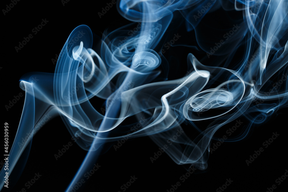 Smoke floating on dark background Smoke floating on dark background