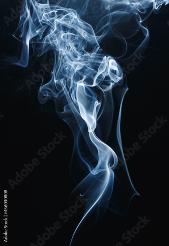 Smoke floating on dark background