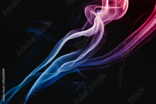 Smoke colorful floating on dark background