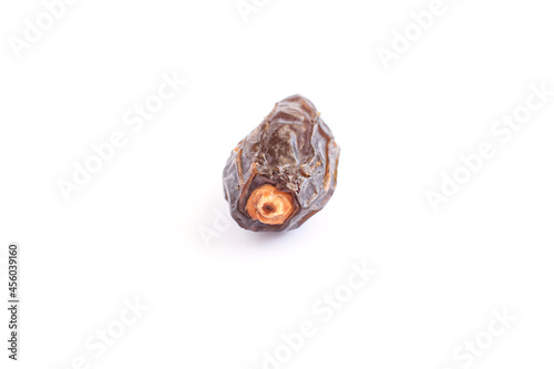Dried date on white isolated background.Close up view.