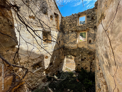 Broken down and abandoned houses in the village of Malo Grablje on the island of Hvar, Croatia. photo