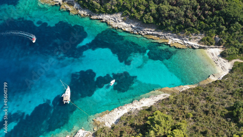 Aerial drone photo of small marina and sandy beach in island of Antipaxos, Ionian, Greece © aerial-drone