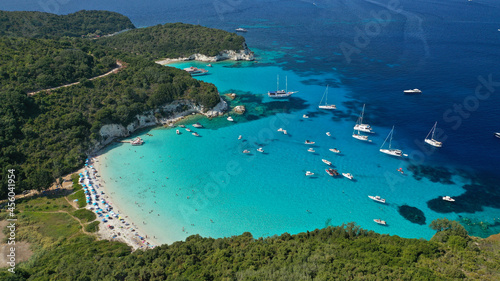 Aerial drone photo of beautiful azure exotic turquoise beach of Voutoumi in island of Antipaxos a popular yacht and sailboat anchorage with crystal clear calm sea, Ionian, Greece