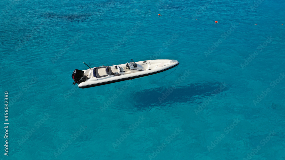 custom made wallpaper toronto digitalAerial top view photo of speed inflatable boat anchored in tropical Caribbean turquoise bay with calm sea