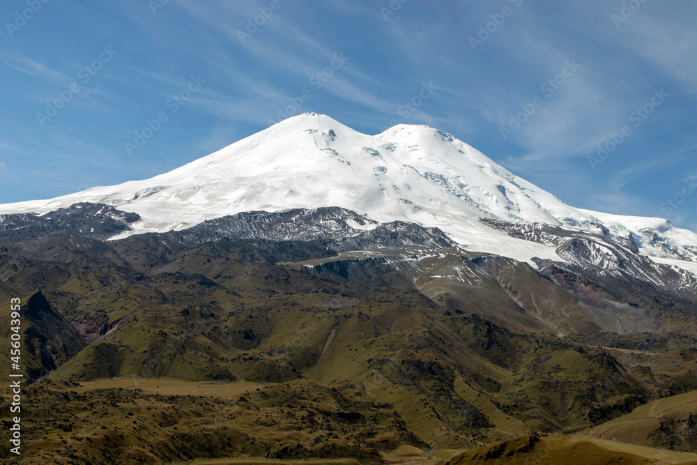 Panoramic view of the slope of Mount Elbrus in the Caucasus Mountains in Russia. Snow-capped peaks.