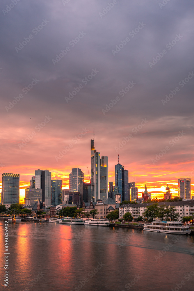 View of Frankfurt at sunset. Backlit shot with a view of the skyline. High-rise buildings of banks and insurance companies in the financial district