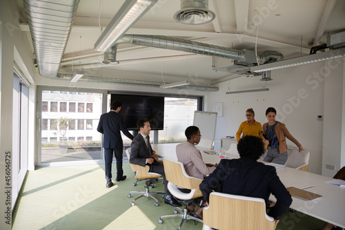 Business people gathering in conference room meeting
