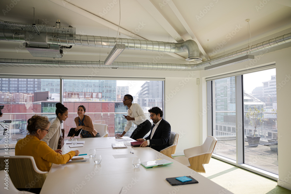 Business people in conference room meeting Business people in conference room meeting