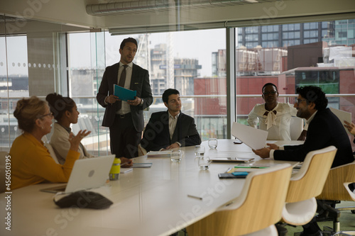 Businessman leading conference room meeting