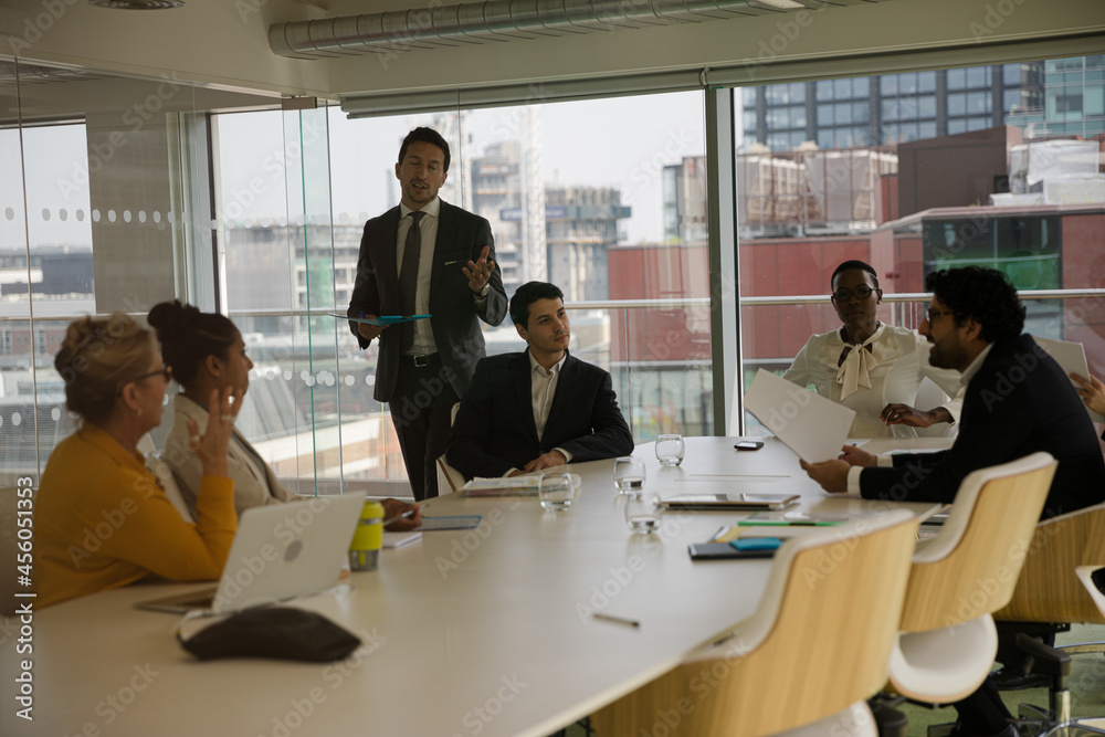 Businessman leading conference room meeting