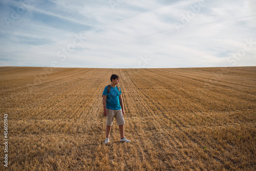 boy in a dry field