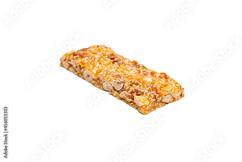 Bar with mix of nuts isolated on a white background.