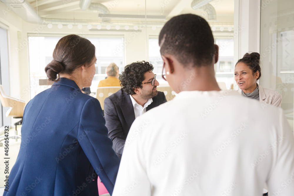 Business people talking in relax zone Business people talking in relax zone