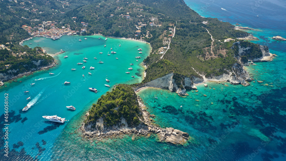 Aerial drone photo of iconic port and fishing village of Lakka or Laka with traditional Ionian architecture a safe anchorage for sail boats and yachts, Paxos island, Ionian, Greece