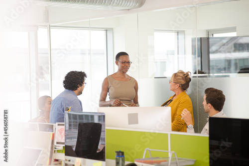 Business people meeting in open plan office