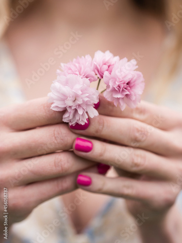  Girl holding a delicate bouquet in her hands