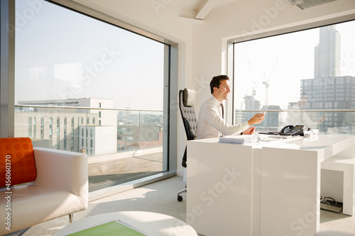 Businessman working at desk in modern office