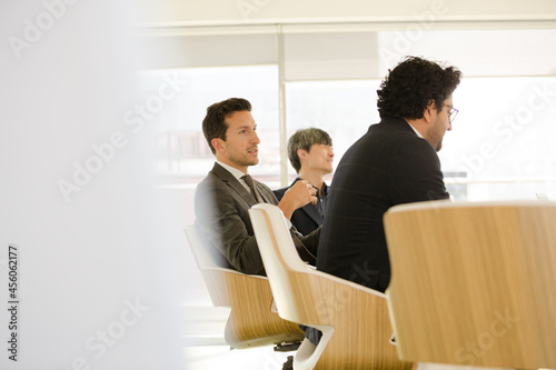 Businessmen in conference room meeting