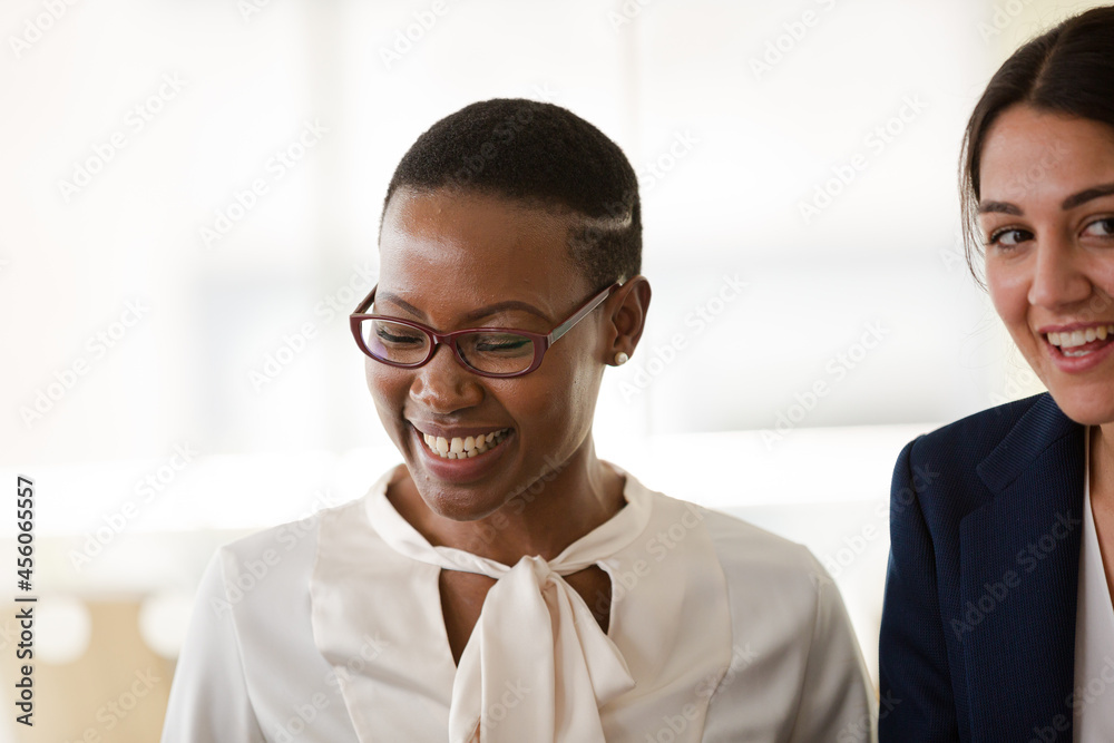 Enthusiastic businesswoman talking to colleague Enthusiastic businesswoman talking to colleague