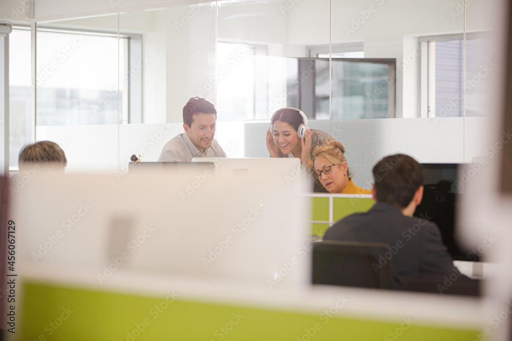 Business people brainstorming in open plan office Business people brainstorming in open plan office