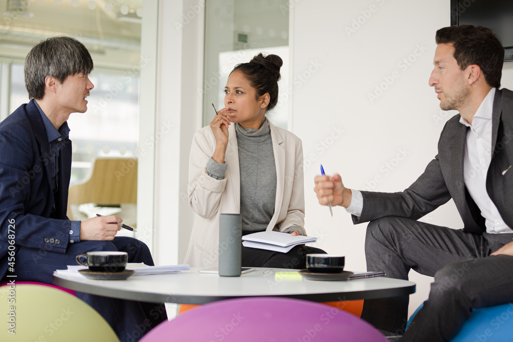 Business people brainstorming in relax zone