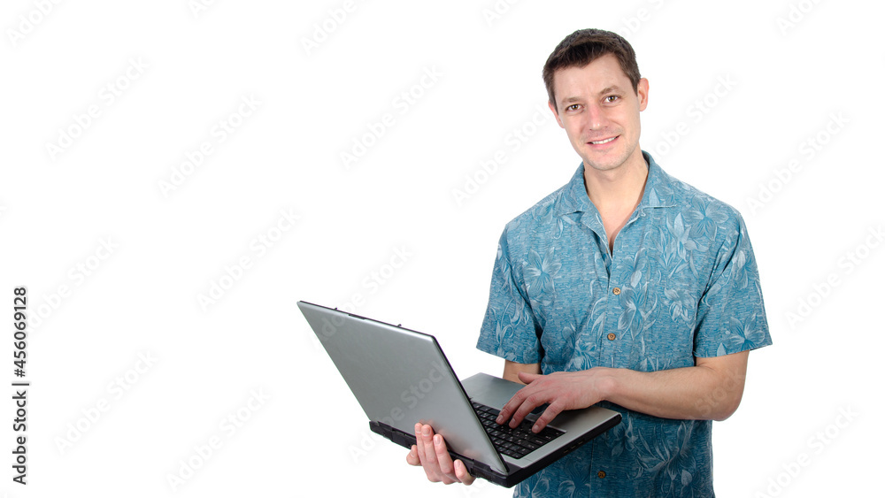 Funny handsome man with laptop. Vacation and work. White background. Funny handsome man with laptop. Vacation and work. White background.