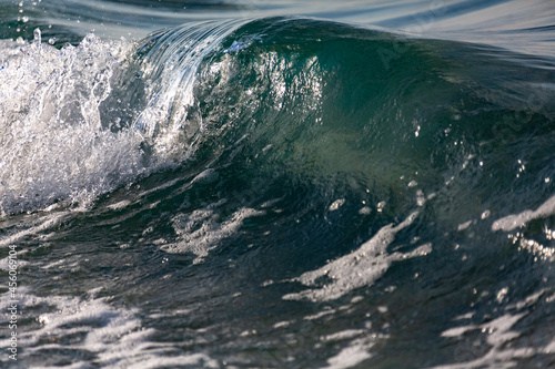 Ocean wave hits the shore of a Cuban beach
