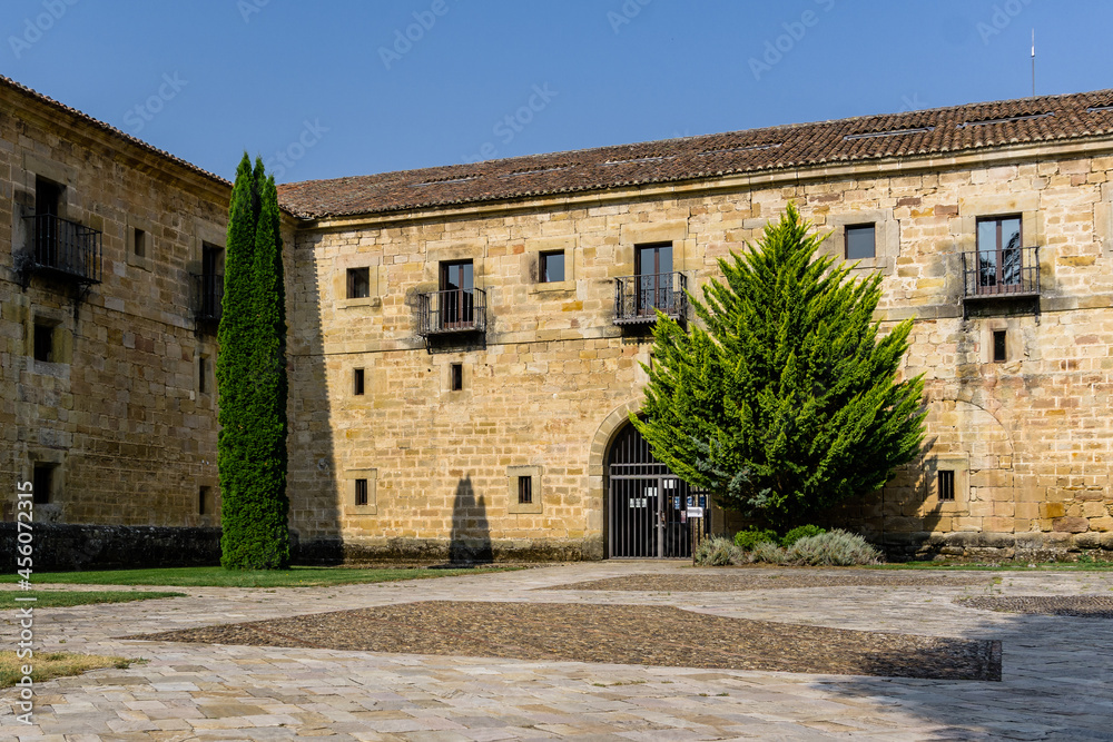 Palencia, Spain - August 21, 2021. Exterior facade of the Santa Maria la Real monastery, Aguilar de Campoo, Palencia, Spain.