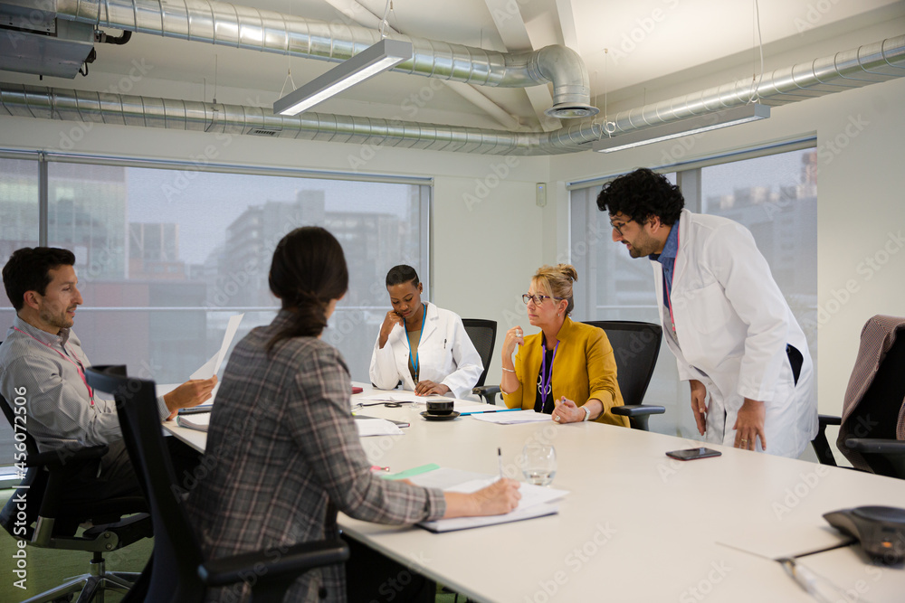 Businessman leading conference room meeting