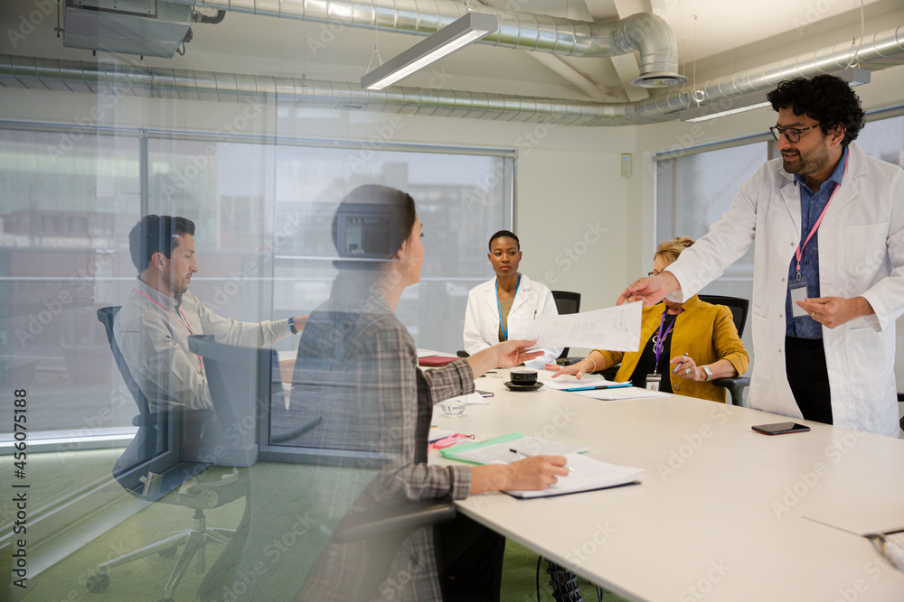 Businessman leading conference room meeting