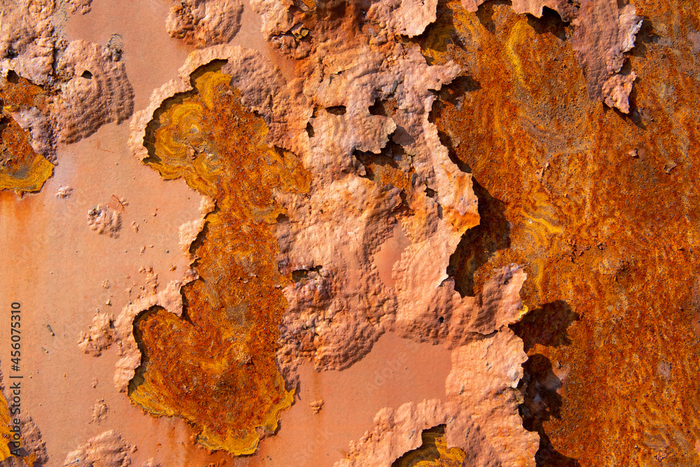 Peeling paint on the rust wall Peeling paint on the rust wall