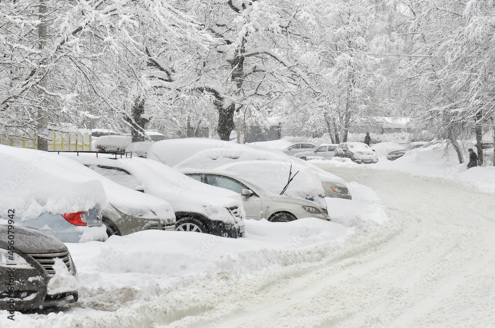 Cars in the parking in heavy snow storm Cars in the parking in heavy snow storm