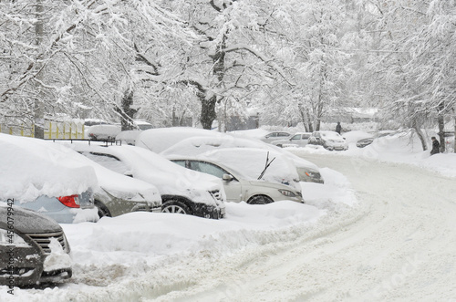  Cars in the parking in heavy snow storm