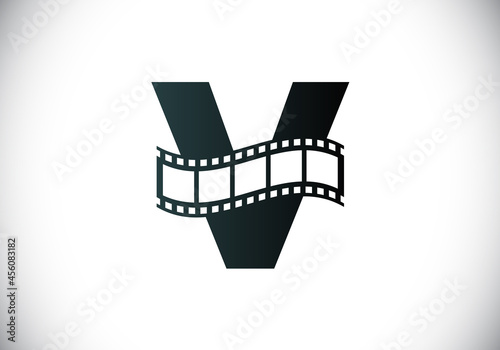 Initial V monogram alphabet incorporated with film reel. Video and movie logo concept. Font emblem. Logo for the entertainment business and company identity
