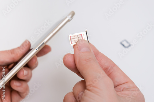 Removing a sim card out of a smartphone, replacing simcard and changing number