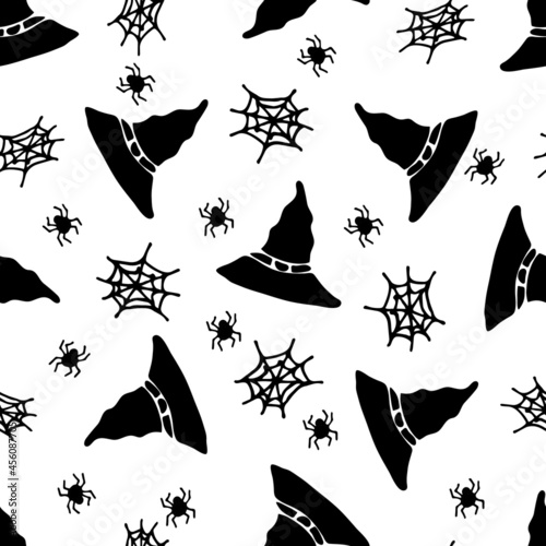 Hand drawn seamless pattern with  Halloween hats on white background. Doodle style. Suitable for wrapping paper, textiles, notebook and  covers, clithes, bags, scrapbooking and wallpaper. Vector illus photo