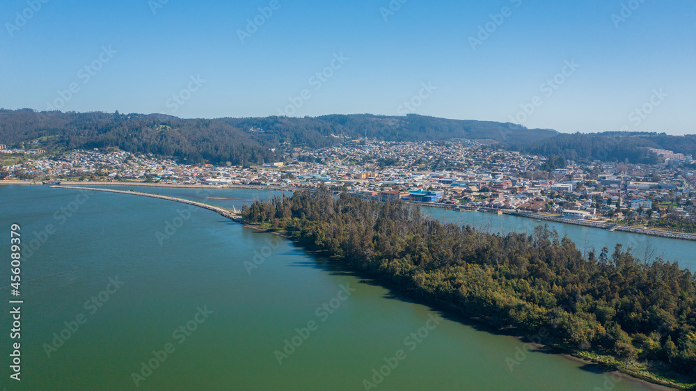 Rio Maule, constitucion, chile, horizontal aerial view with drone of the river and city 