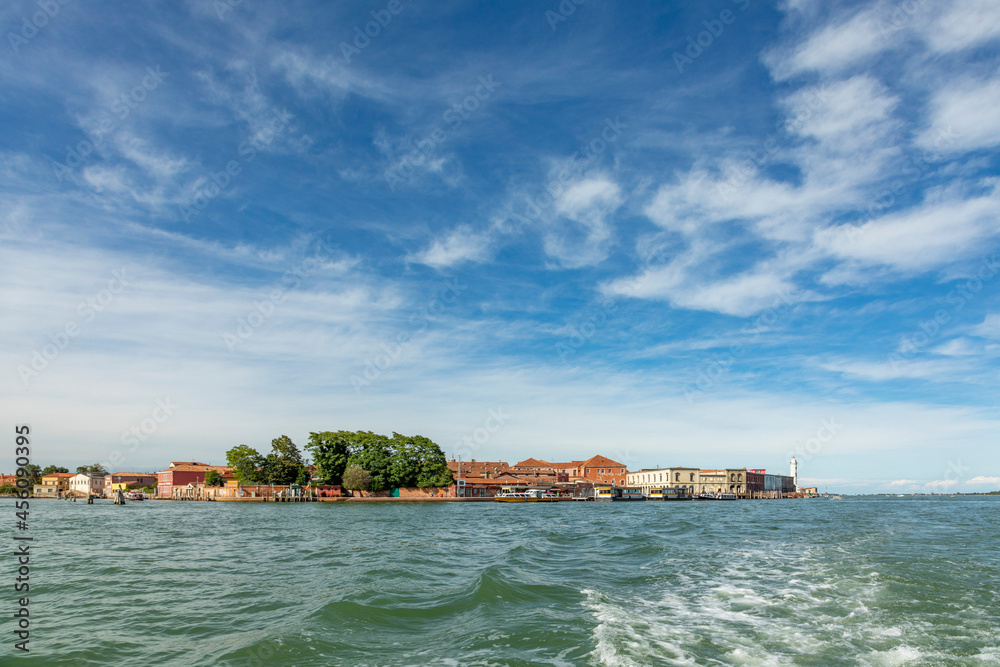 scenic view to island of Murano in Venice area with small canal and historic houses, Murano scenic view to island of Murano in Venice area with small canal and historic houses, Murano