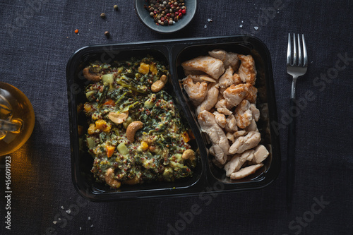 Green kale salad with chicken in lunch box