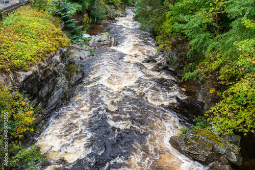 View of Clunie Water river in Aberdeenshire, Scotland. It is a tributary of the River Dee, joining the river at Braemar. photo