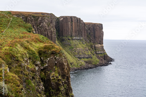 View toward the pillars of the Kilt Rock in the Isle of Skye in Scotland. © Alizada Studios