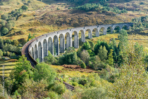 Glenfinnan Railway Viaduct in Glenfinnan, Scotland. The viaduct was built in 1901. It is the longest concrete railway bridge in Scotland at 416 yards (380 m), and crosses the River Finnan at a height 