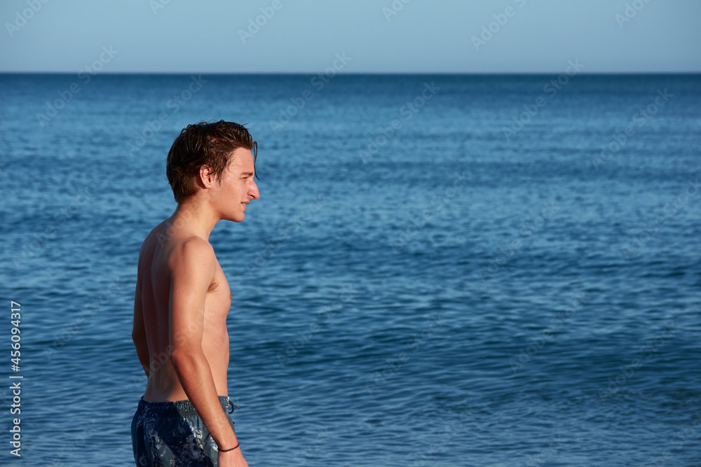 A portrait of a young fit caucasian male in the sea A portrait of a young fit caucasian male in the sea