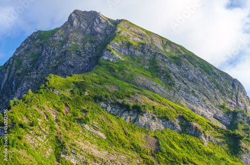 Fototapeta Naklejka Na Ścianę i Meble -  Mountain peaks in summer on a sunny day together with clouds