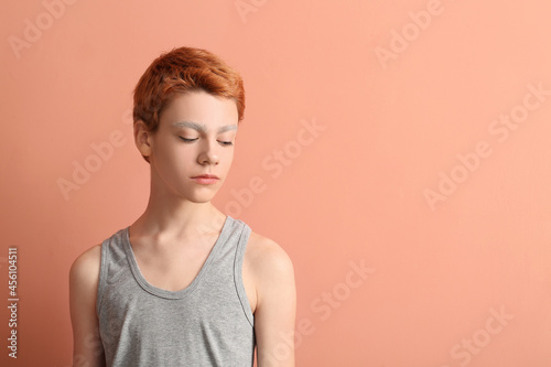 Teenage boy with dyed eyebr...