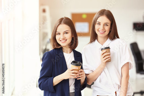 Female colleagues drinking ...