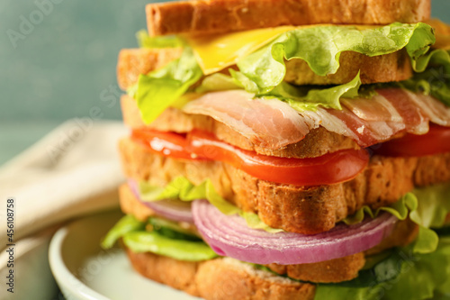 Plate with tasty sandwich o...