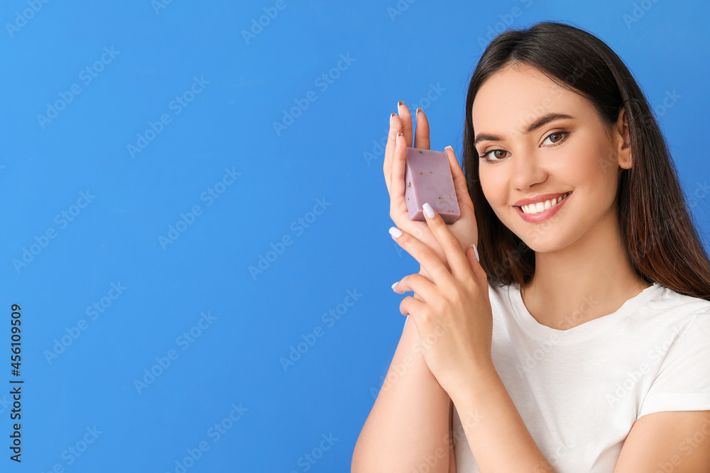 Beautiful young woman with soap on color background Beautiful young woman with soap on color background