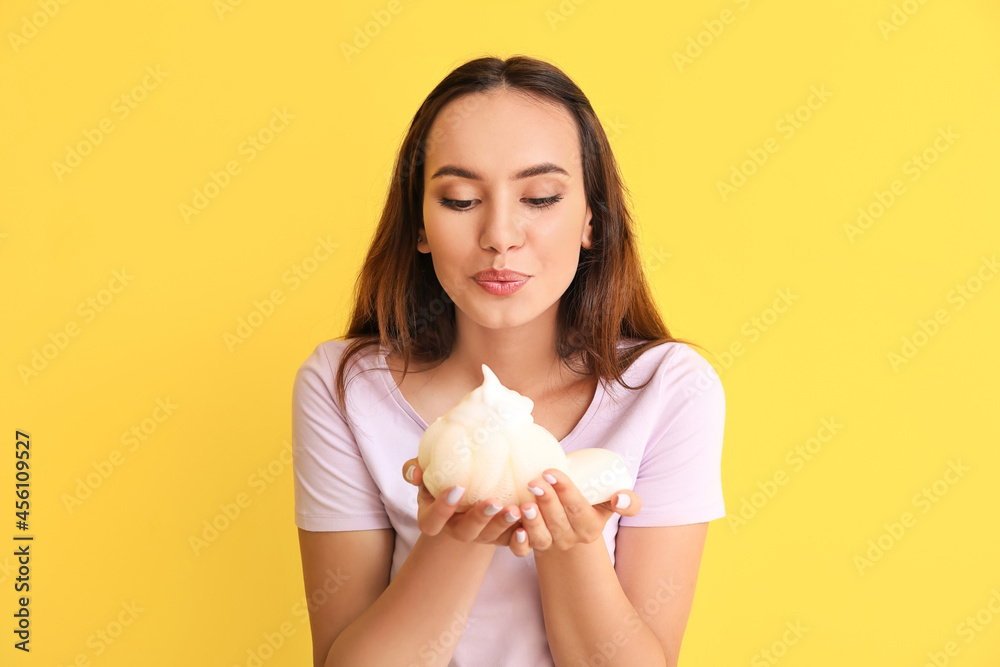Beautiful young woman with soap and bast wisp on color background Beautiful young woman with soap and bast wisp on color background